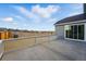 An outdoor deck with white railings overlooks the fenced backyard and neighborhood at 16549 Black Rose Cir, Parker, CO 80134