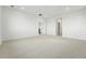 Versatile bonus room with carpet, neutral walls, and white trim, providing a flexible living space at 16549 Black Rose Cir, Parker, CO 80134