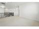 Spacious loft area with plush carpeting, neutral walls, and contemporary railing overlooking the stairs at 16549 Black Rose Cir, Parker, CO 80134