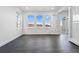 Bright room with hardwood floors and large windows offering ample natural light and beautiful views at 16549 Black Rose Cir, Parker, CO 80134