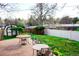 Lush backyard with green grass and a spacious concrete patio, great for outdoor activities at 5431 S Hickory St, Littleton, CO 80120