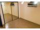 Bedroom with mirrored closet doors and dark window treatments at 5431 S Hickory St, Littleton, CO 80120
