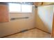 Bedroom with neutral colors and bright window at 5431 S Hickory St, Littleton, CO 80120
