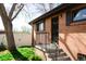 Inviting front entrance with a secure gate and well-manicured landscaping at 5431 S Hickory St, Littleton, CO 80120