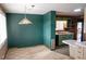 View of dining and kitchen with updated paint at 5431 S Hickory St, Littleton, CO 80120