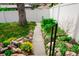 Scenic pathway with colorful landscaping and natural stone accents at 5431 S Hickory St, Littleton, CO 80120