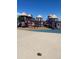 Well-equipped playground with slides, climbing structures, and a cushioned ground for safety at 5431 S Hickory St, Littleton, CO 80120
