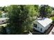 Aerial exterior backyard view with a door and window allowing a peek into the home at 4430 S Cherokee St, Englewood, CO 80110