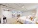 Spacious bedroom with white walls, carpet and sliding door entry to closet/bath at 4430 S Cherokee St, Englewood, CO 80110