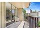 Cozy balcony with sliding glass doors, ideal for enjoying a private outdoor retreat at 2231 S Vaughn Way # 317 B, Aurora, CO 80014