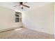 Serene bedroom with a large window, neutral carpet, and ample natural light at 2231 S Vaughn Way # 317 B, Aurora, CO 80014