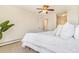 Spacious bedroom features a comfortable bed, neutral walls and a doorway to additional rooms at 2231 S Vaughn Way # 317 B, Aurora, CO 80014