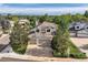 Stunning two-story home with a three-car garage, mature trees and meticulous landscaping at 360 Morning Star Ln, Lafayette, CO 80026