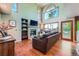 Inviting living room featuring vaulted ceilings, gas fireplace, and hardwood floors at 360 Morning Star Ln, Lafayette, CO 80026