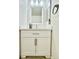 Well-lit bathroom vanity with storage and modern fixtures at 12830 Jasmine St # A, Thornton, CO 80602