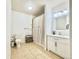Clean bathroom featuring a shower/tub combo, toilet, and vanity with good lighting at 12830 Jasmine St # A, Thornton, CO 80602