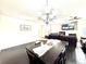 Charming dining area with a stylish table and chairs, perfect for Gathering meals and gatherings at 12830 Jasmine St # A, Thornton, CO 80602