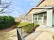 Charming front entrance featuring stone accents, landscaped garden, and a welcoming entryway at 12830 Jasmine St # A, Thornton, CO 80602