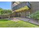 Charming backyard featuring a well-maintained lawn and patio area at 460 S Marion Pkwy # 102, Denver, CO 80209