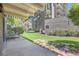 Landscaped courtyard with lush greenery and an inviting walkway at 460 S Marion Pkwy # 102, Denver, CO 80209