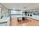 Modern laundry room with multiple washers and dryers for convenience at 460 S Marion Pkwy # 102, Denver, CO 80209