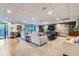 Inviting living room featuring contemporary furnishings, a large television, and stylish decor at 460 S Marion Pkwy # 102, Denver, CO 80209