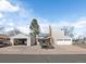 Features a detached garage and RV parking and a well-maintained lawn at 4391 S Tabor Ct, Morrison, CO 80465