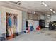Well-organized garage with lockers, tool chests, and an off-road vehicle, maximizing storage at 4391 S Tabor Ct, Morrison, CO 80465