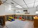 ' playroom featuring a playful camo accent wall and room to play at 4391 S Tabor Ct, Morrison, CO 80465