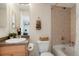 Inviting bathroom featuring vanity with sink, toilet, and a tiled shower-bathtub combination at 15800 E 121St Ave # 4G, Brighton, CO 80603