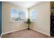Bedroom with large windows bringing in natural light and views of outside at 15800 E 121St Ave # 4G, Brighton, CO 80603