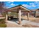 Community gazebo with seating, offering a shaded area for outdoor gatherings and picnics at 15800 E 121St Ave # 4G, Brighton, CO 80603