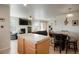Bright living room with fireplace, open to kitchen and dining area, great for entertaining at 15800 E 121St Ave # 4G, Brighton, CO 80603