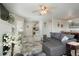 Spacious living room with plenty of natural light, comfortable seating, and modern decor at 15800 E 121St Ave # 4G, Brighton, CO 80603