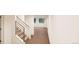 Modern stairwell with metal railing leading to the upper level at 22321 E 38Th Pl, Aurora, CO 80019