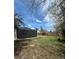 Large backyard with grass and a wooden fence, perfect for outdoor activities and privacy at 1100 N Hanover St, Aurora, CO 80010