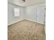 Bedroom with plush carpet and window at 1100 N Hanover St, Aurora, CO 80010