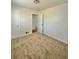 Spacious bedroom with neutral carpet and a double closet for storage at 1100 N Hanover St, Aurora, CO 80010