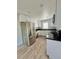 Well-lit kitchen featuring white cabinets and stainless steel appliances at 1100 N Hanover St, Aurora, CO 80010