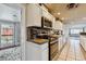 Well-equipped kitchen features modern appliances, ample countertop space, and convenient layout for cooking and entertaining at 3559 Meadow Ln, Brighton, CO 80603