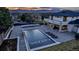 Expansive backyard featuring a large pool, hot tub, patio, mature landscaping, and private setting at 15902 W 64Th Ave, Arvada, CO 80007