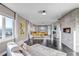 Large main bedroom with a fireplace, mountain views, and sitting area at 15902 W 64Th Ave, Arvada, CO 80007