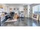 Bright artist studio with large windows, artwork, and neutral walls and modern flooring at 15902 W 64Th Ave, Arvada, CO 80007