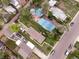 Aerial view of single-story houses with compact backyard and mature trees at 2258 S Galapago St, Denver, CO 80223