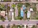 Overhead view of a residential neighborhood featuring well-maintained homes and mature trees along a quiet street at 2258 S Galapago St, Denver, CO 80223