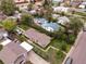 This aerial view shows a single-story home in a neighborhood with alley access and compact backyard at 2258 S Galapago St, Denver, CO 80223