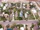 An overhead view displays various homes surrounded by green yards at 2258 S Galapago St, Denver, CO 80223