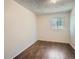 Bright bedroom with wood floors and a single window at 2258 S Galapago St, Denver, CO 80223