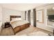 Bedroom with natural light, neutral carpet, and updated window treatments at 1150 Inca St # 39, Denver, CO 80204