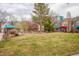 Exterior of a townhouse community with a green lawn at 1150 Inca St # 39, Denver, CO 80204